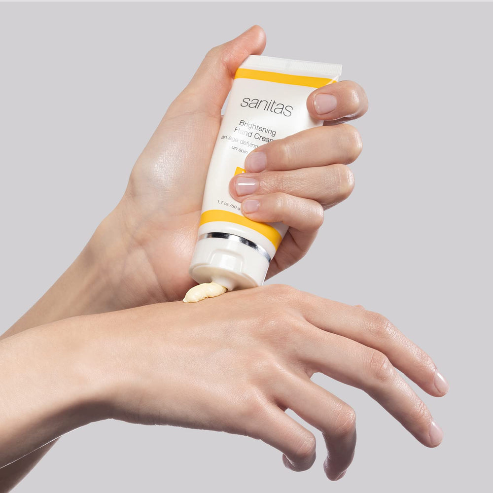 Sanitas Brightening Hand Cream ingredients label featuring vitamin C and sea buckthorn.
