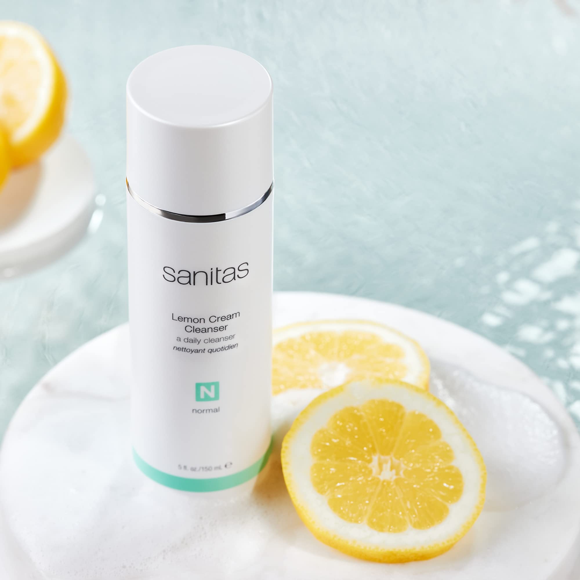Sanitas Lemon Cream Cleanser texture close-up reveals creamy, hydrating formula.