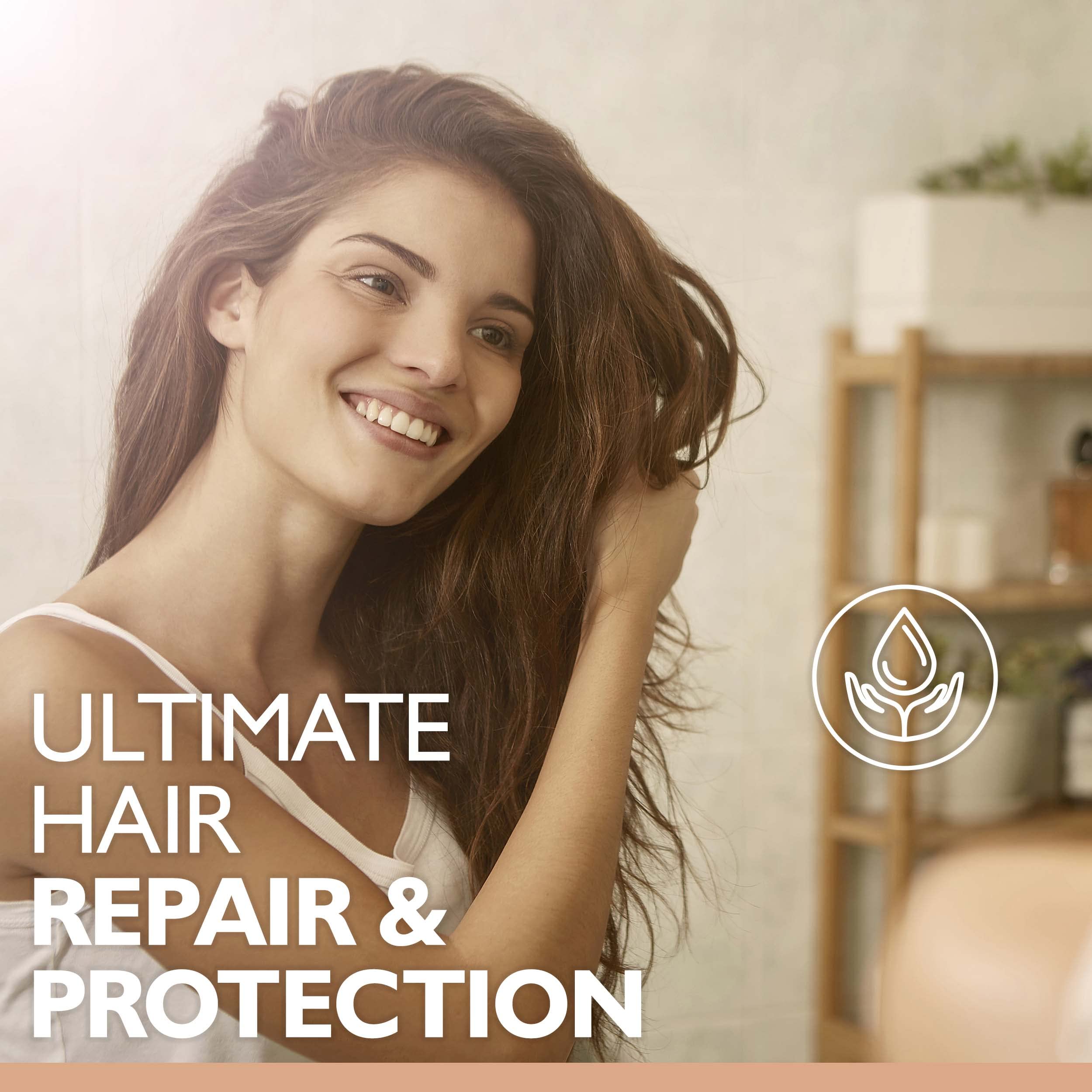 Saryna Key Damage Repair Light Shampoo on hair shows gentle cleansing