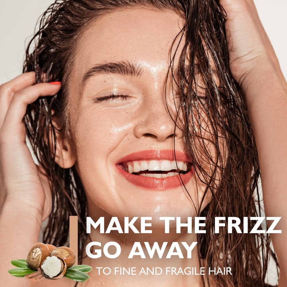 Focusing product on the ends with Saryna Key Light Treatment Butter Mask.