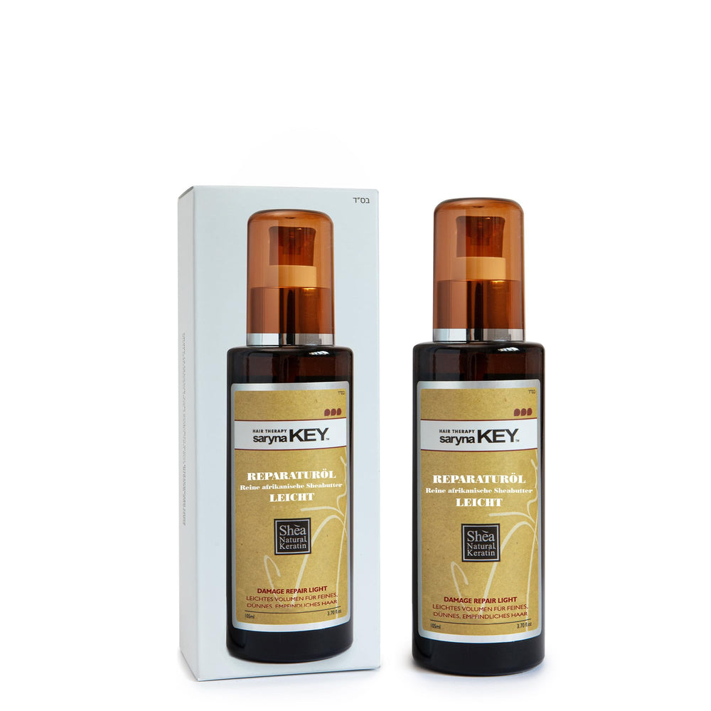 Saryna Key Repair Oil bottle close-up highlighting shine boost for hair
