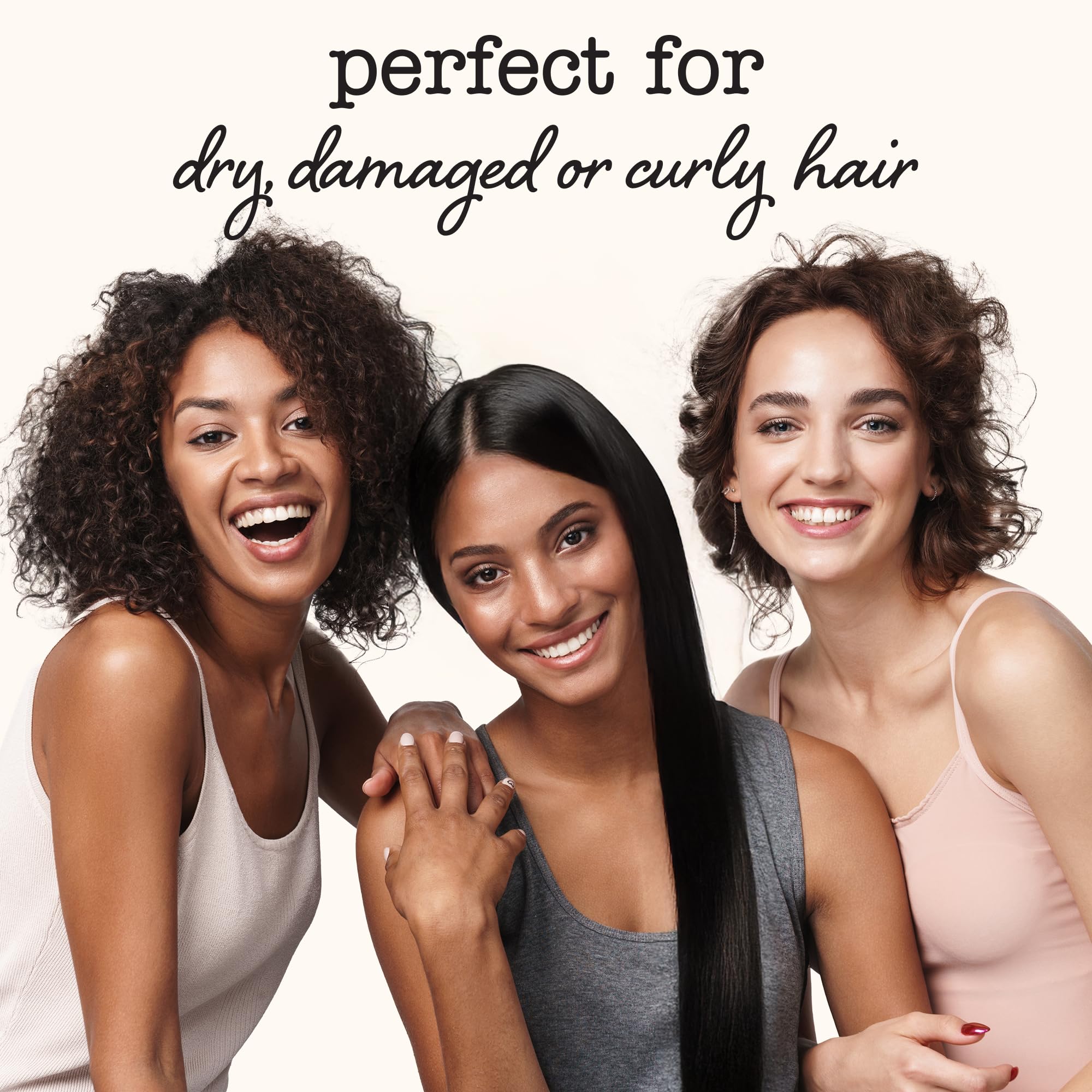 Sauce Beauty Coconut Cream Conditioner on frizzy curls ready to tame.
