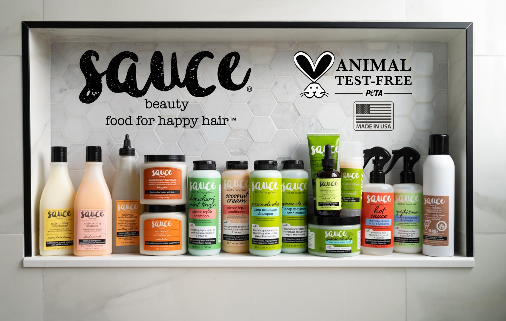 Sauce Beauty Creamy House Dressing Conditioner bottle on vanity ready for daily routine.