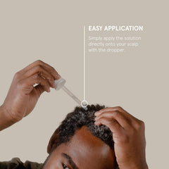 Scalp closeup showing Keeps Minoxidil application