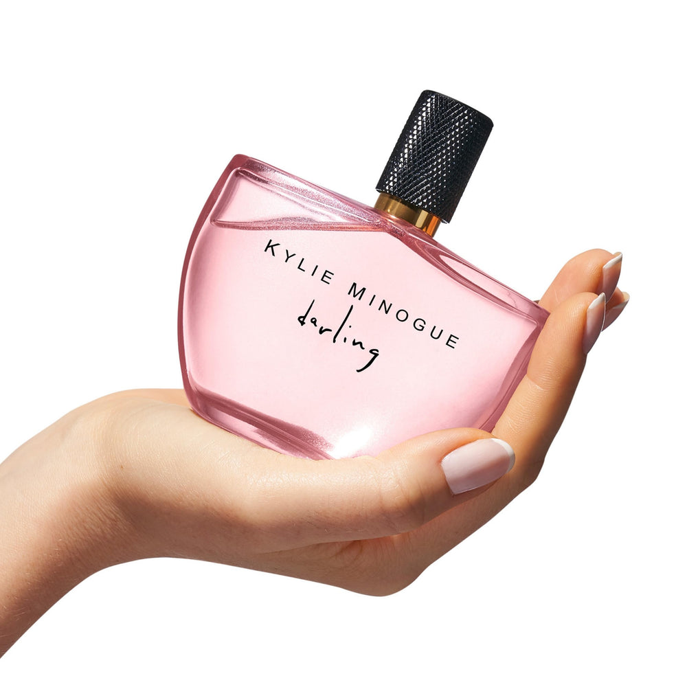 SCENT BEAUTY Kylie Minogue Darling EDP heart notes reveal soft lilies for a graceful bloom.