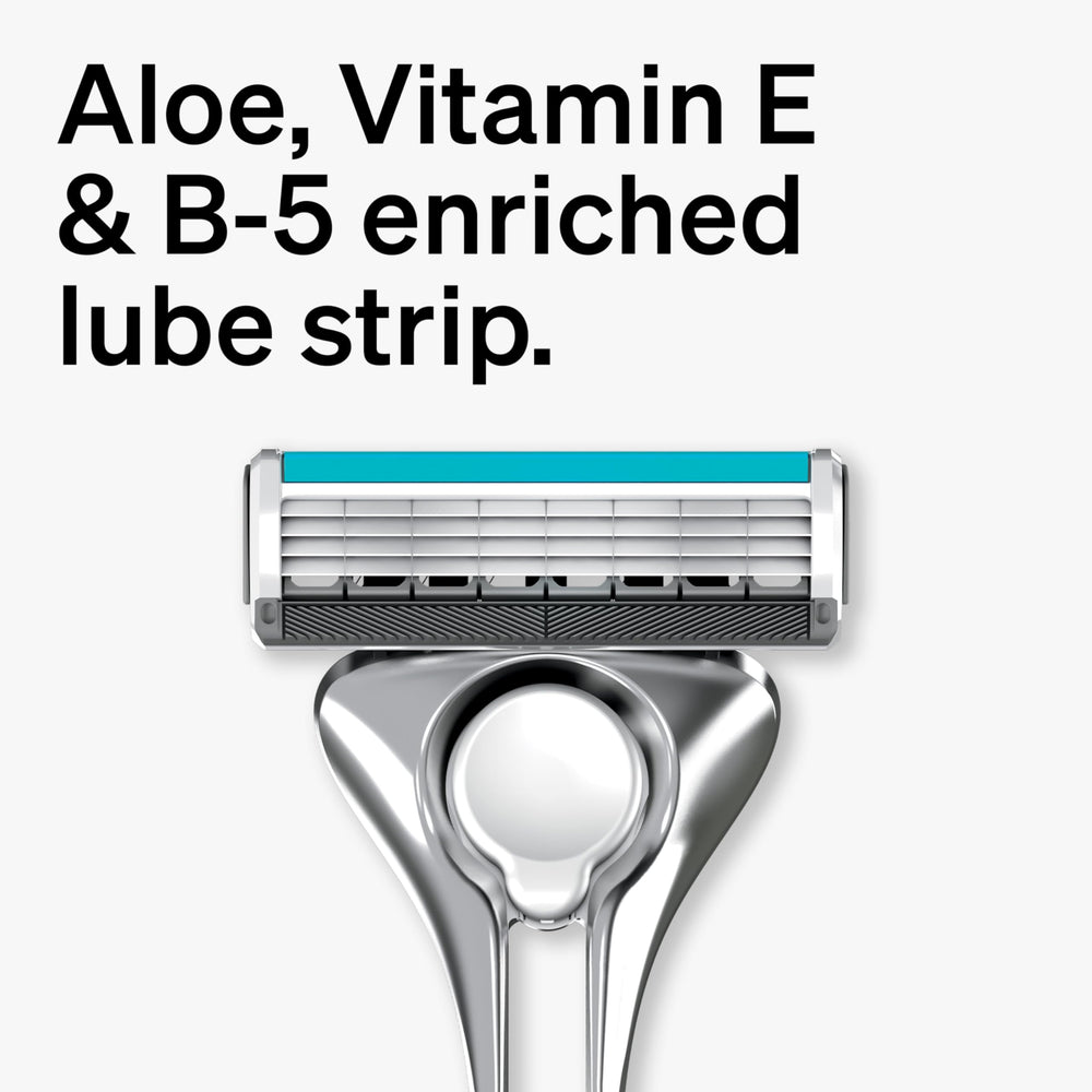 Close-up of Schick Quattro Titanium blades showing four blades.