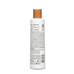 Schwarzkopf Professional BC Bonacure Q10+ Time Restore conditioner creamy texture softens and detangles hair.