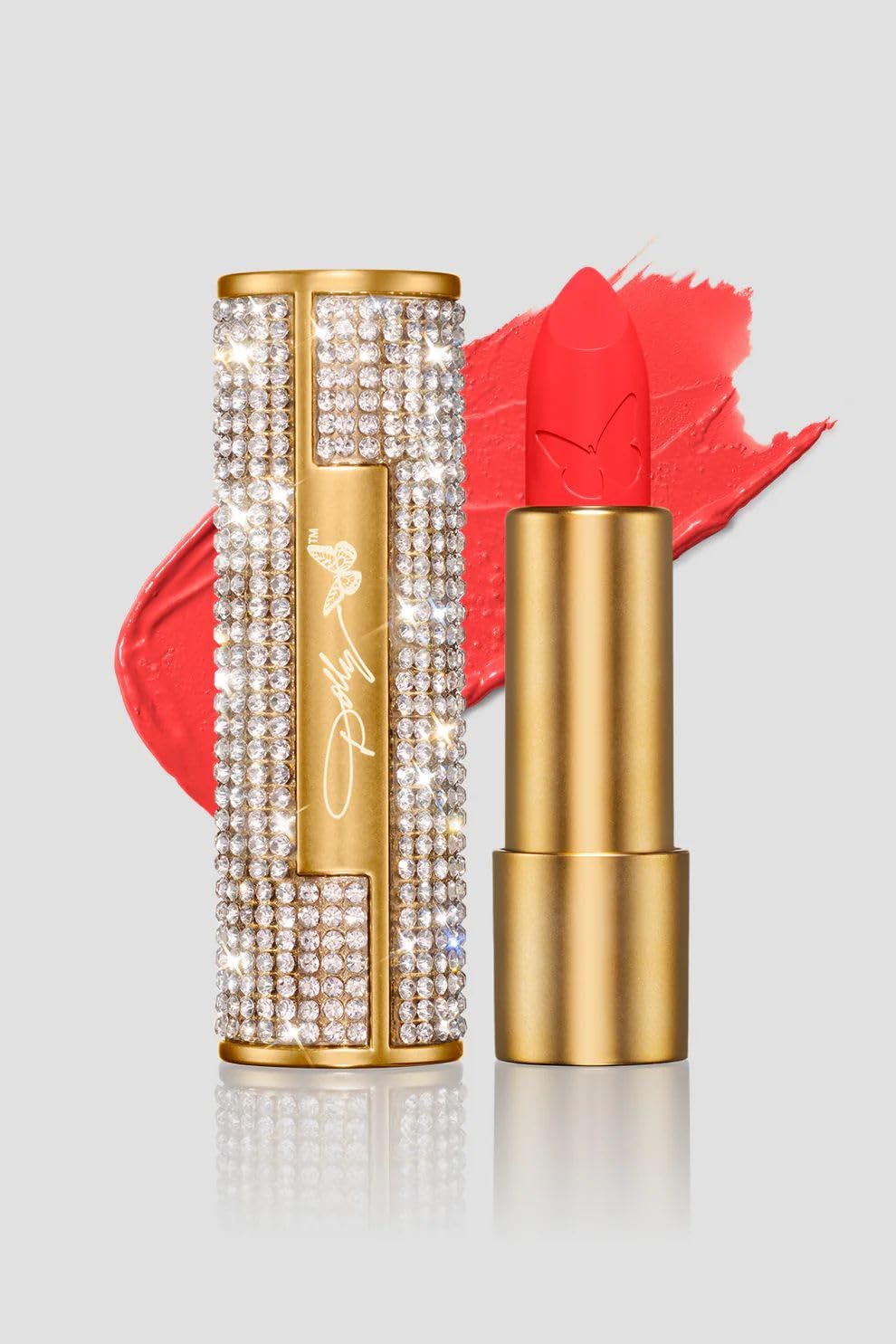 SCENT BEAUTY Dolly Lipstick Poppy Field case with rhinestones for portable glamour.