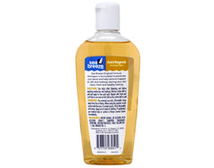 Seabreeze Astringent applying on face with cotton pad for gentle cleansing.