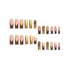 SEENEEY nail tips featuring rhinestones and gold flowers for a feminine touch
