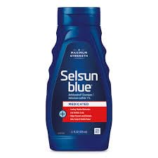 Selsun Blue medicated shampoo bottle for gentle scalp care.