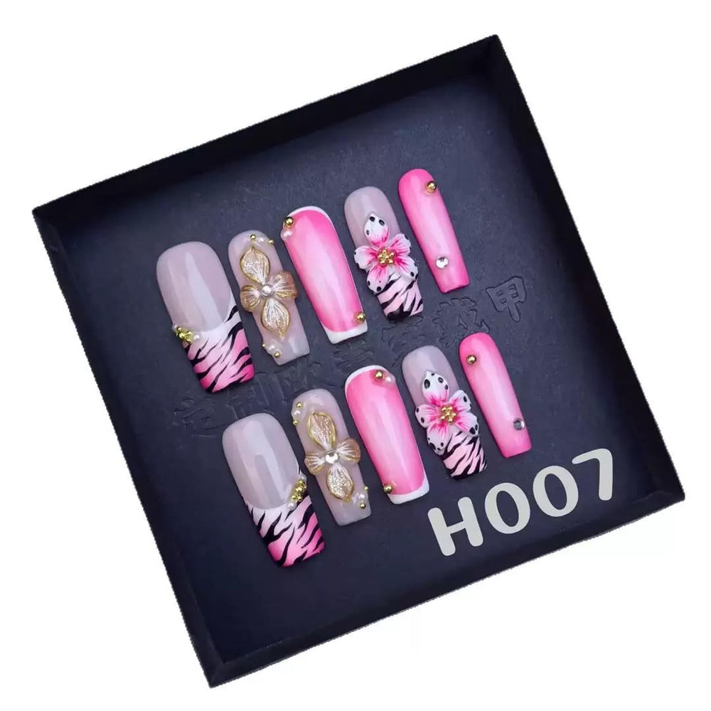 Sevgob leopard French tips nails offering bold style for events