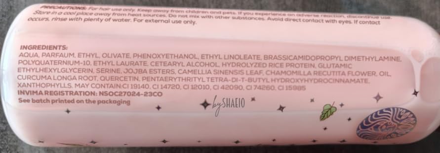 SHAEIO Ritual Botanico on a sunny beach day protecting hair.