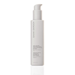 SHANI DARDEN Body Reform Serum bottle closeup highlighting Granactive Retinoid for firmer-looking skin.