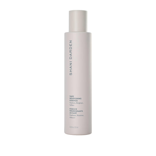 Shani Darden Sake Nourishing Essence bottle close-up showcases hydration and calm for dehydrated skin