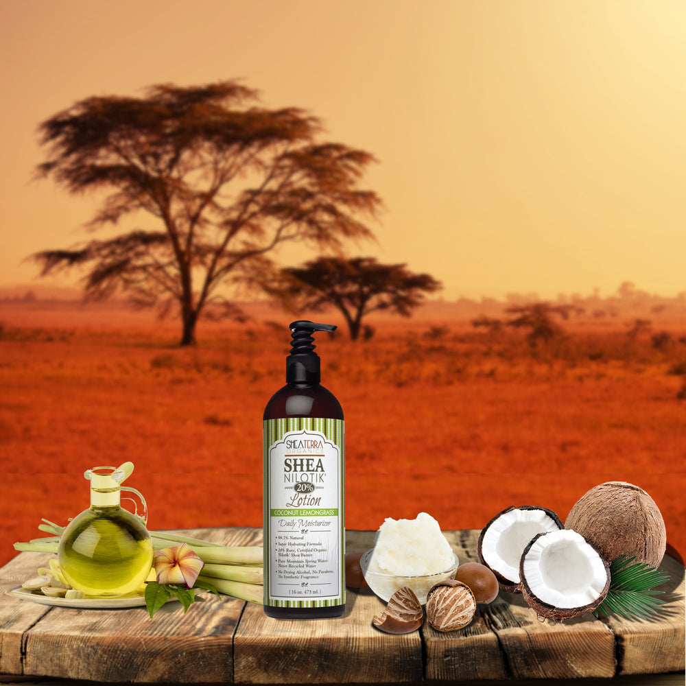 Hands applying Shea Terra Organics Nilotik’ lotion for smooth moisture.