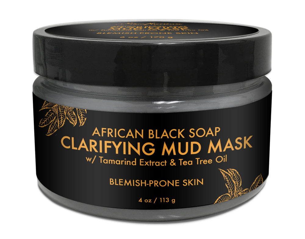 Sheamoisture African Black Soap Mask application demonstrates purifying action for troubled skin.