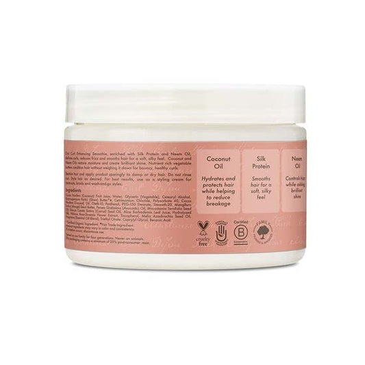 Sheamoisture Coconut & Hibiscus Curl Enhancing Smoothie being applied to hair for moisture and shine.