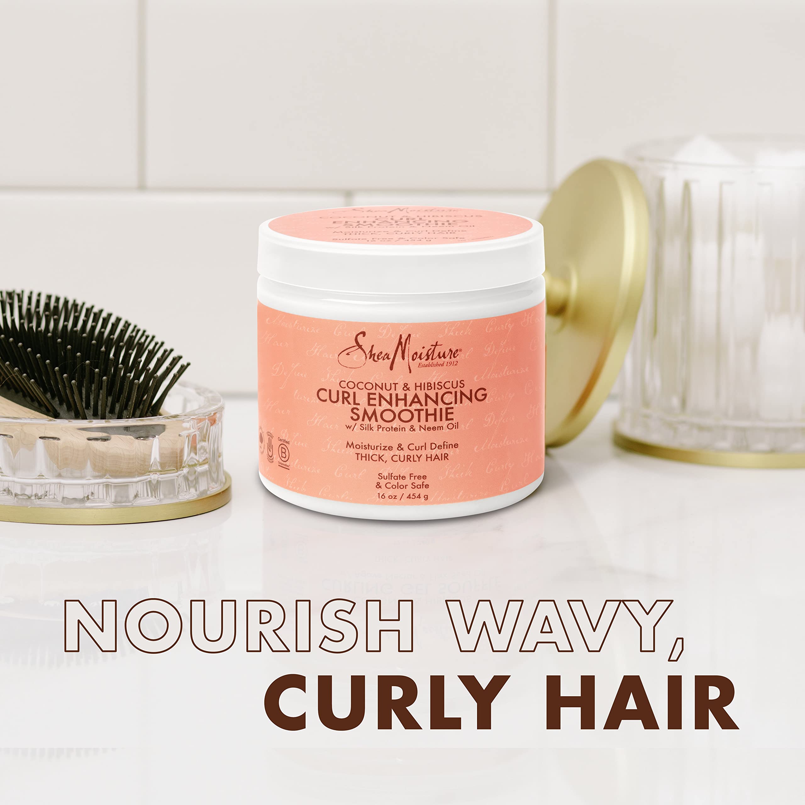 Coconut oil and hibiscus flowers ingredients highlight nourishing shine potential.