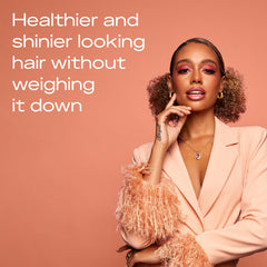 Frizz-controlled curl close-up showing smooth, defined strands.