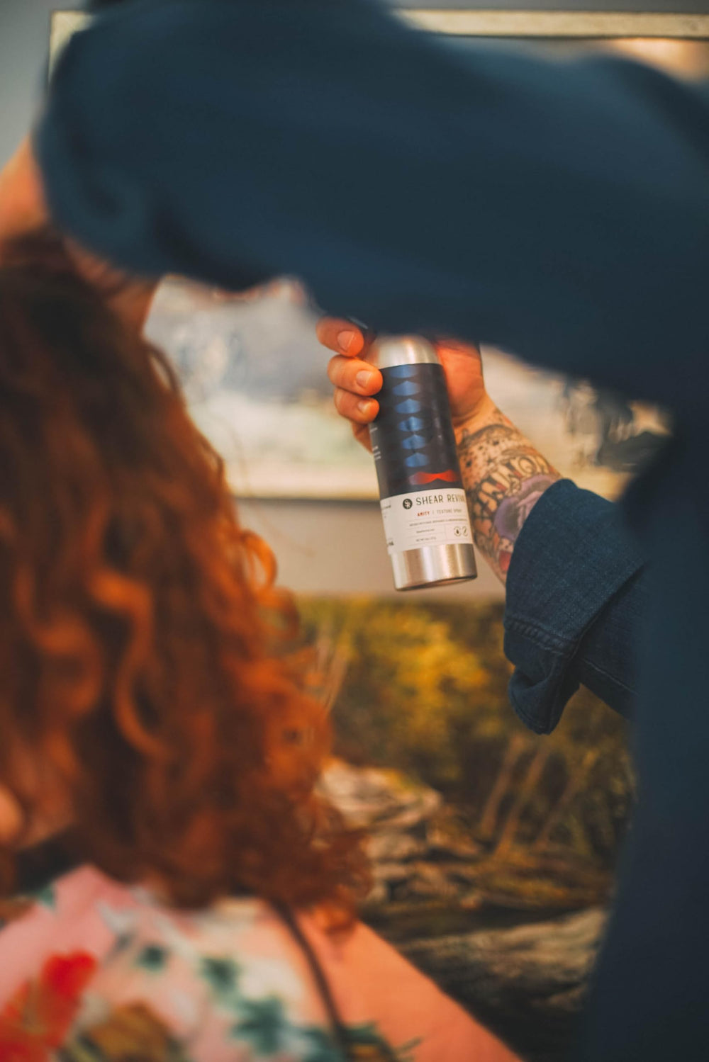 Amity Texture Spray mist application on hair for texture and volume