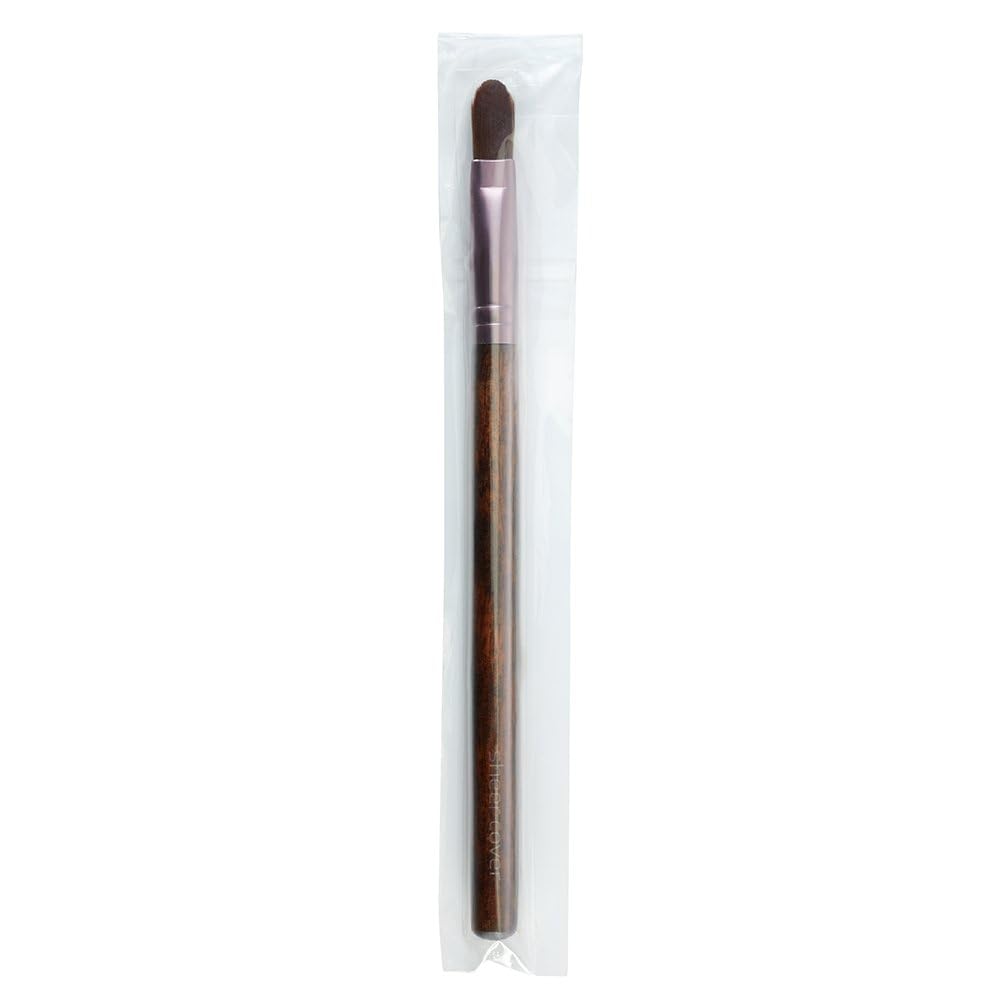 Sheer Cover Studio Conceal & Brighten Trio close-up shows creamy, blendable texture.
