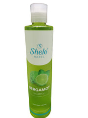 Sheló NABEL Bergamot Shampoo bottle pour for gentle cleansing of brittle hair.