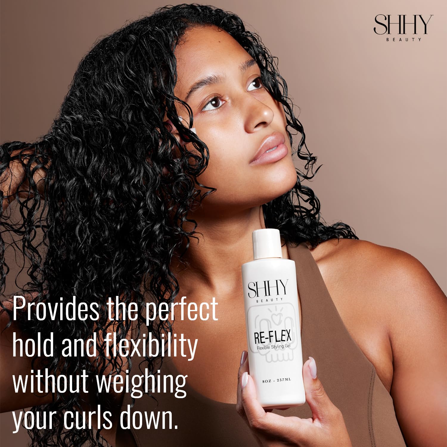 SHHY BEAUTY RE-FLEX frizz-control on curls for sleek, frizz-free styling.
