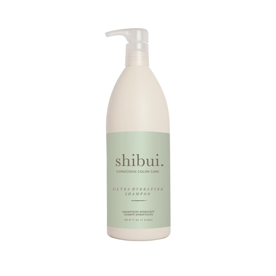 SHIBUI Ultra Hydrating Shampoo bottle pour shows moisture-rich cleanse for color-treated hair.