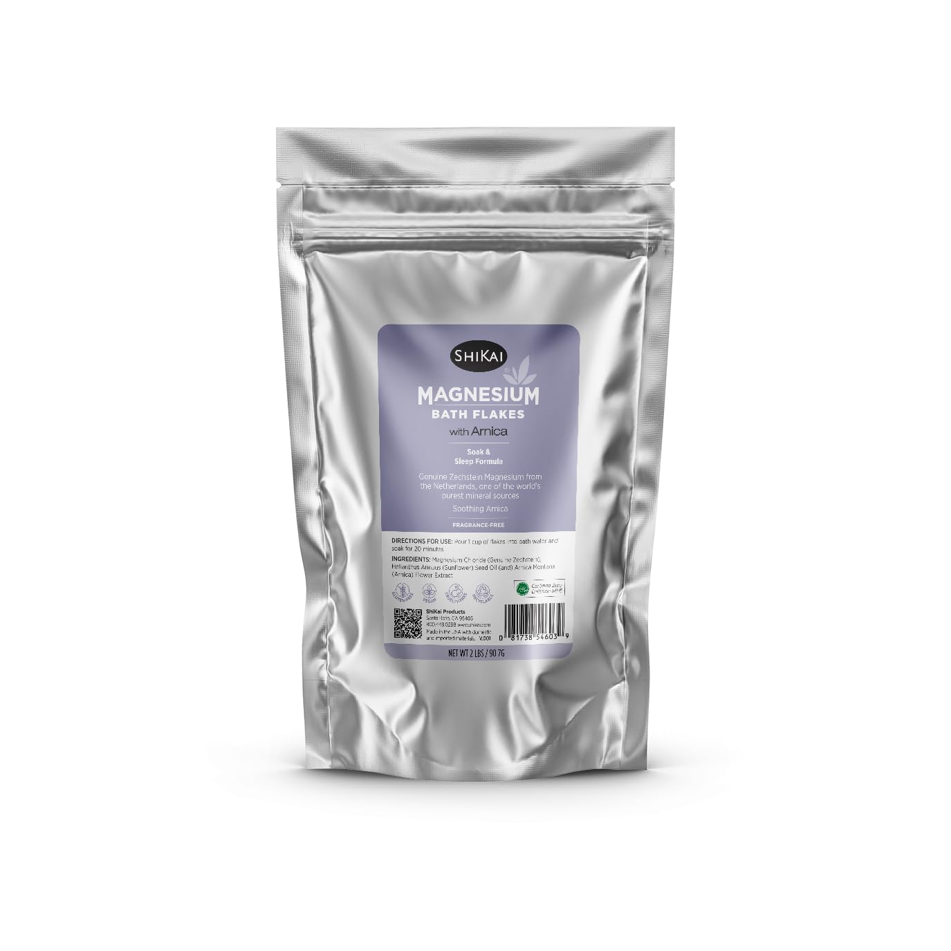 ShiKai magnesium bath flakes with arnica soaking in tub for soothing relaxation