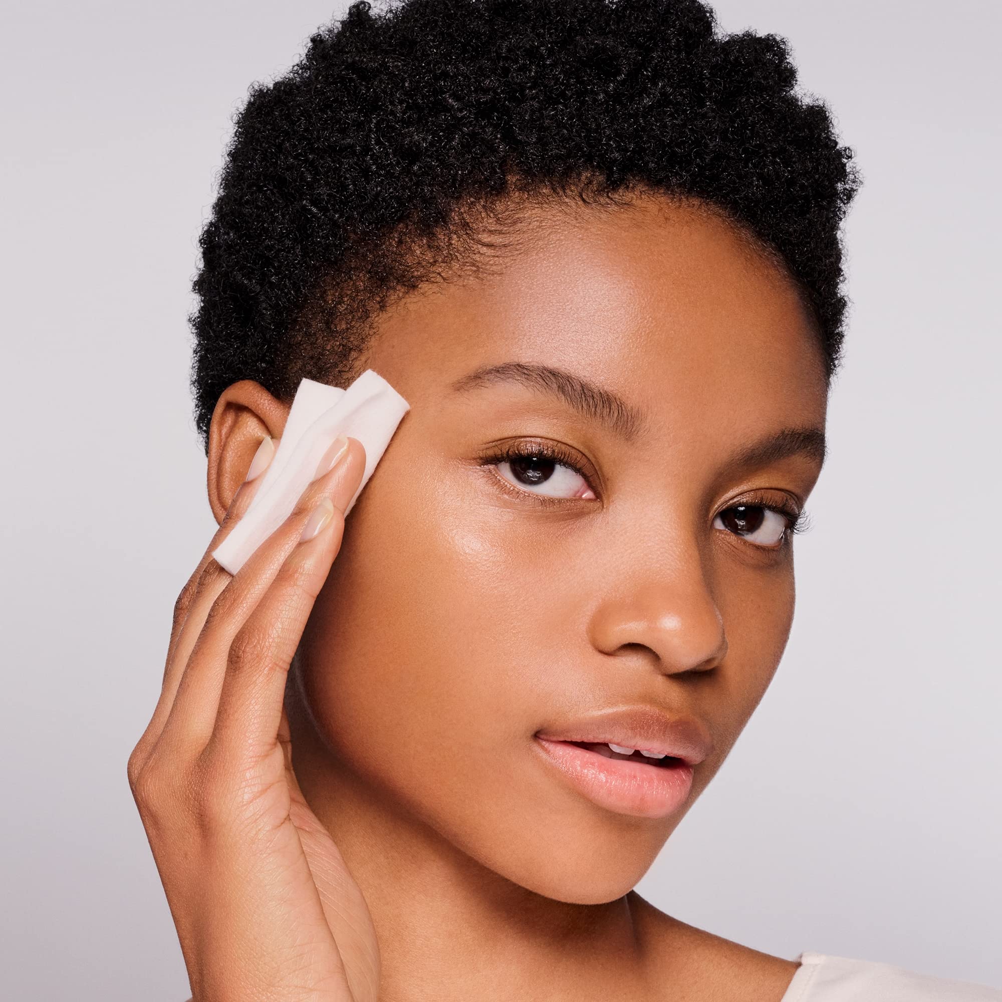 Shiseido Eudermine Activating Essence applied to skin with gentle tapping