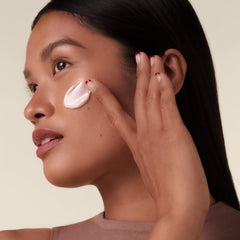 Shiseido neck application with upward sweep for defined jawline