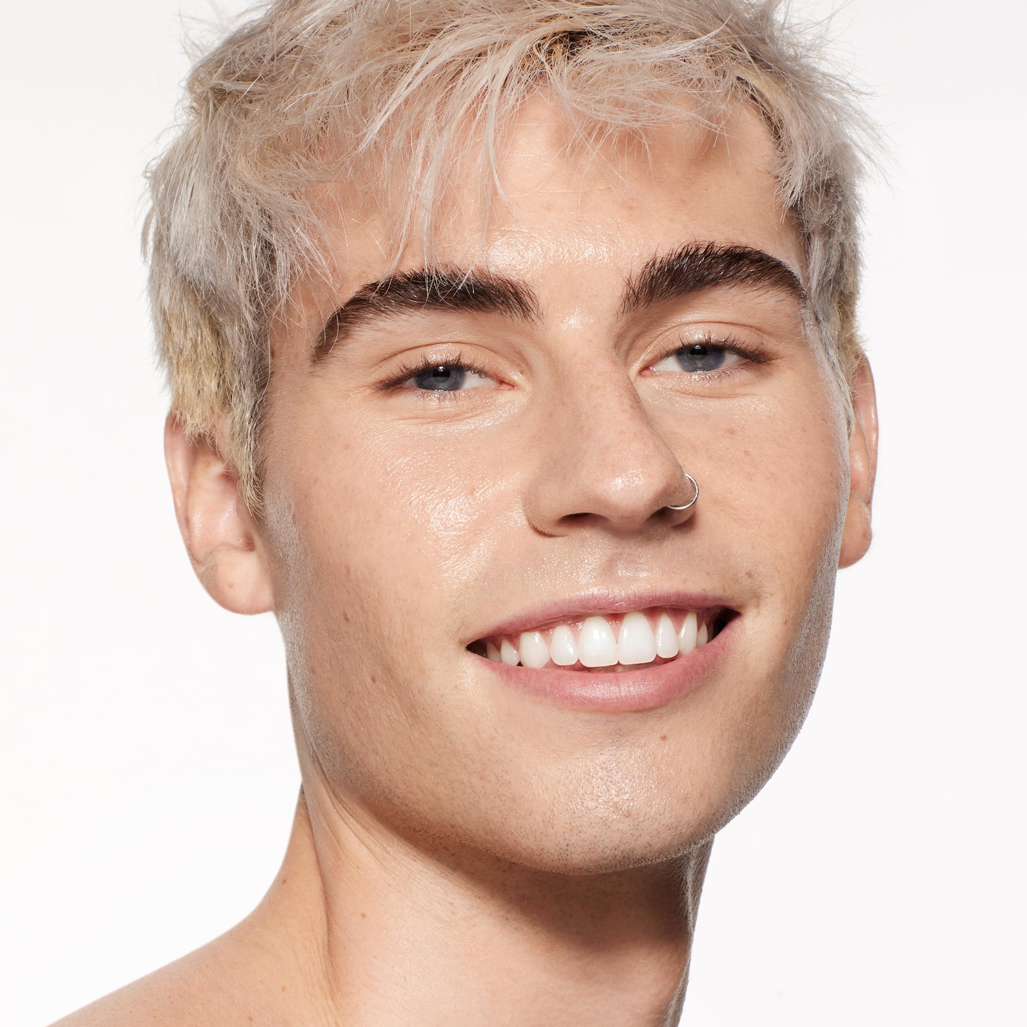 Shiseido RevitalEssence Foundation during wear with crease resistance and long-lasting finish.