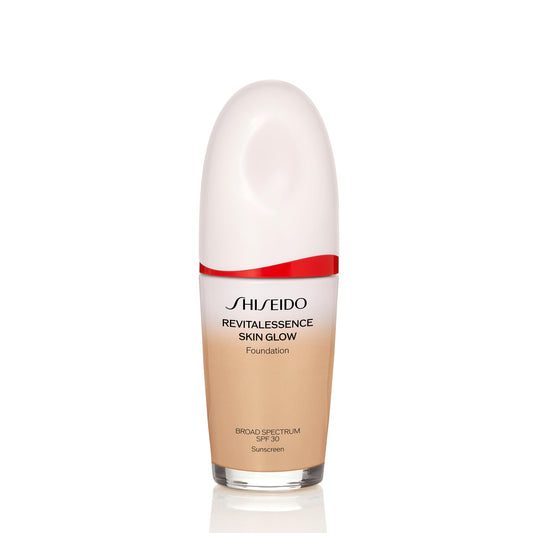 Shiseido RevitalEssence Skin Glow Foundation bottle reveals a luminous, long-wearing finish for all-day radiance.