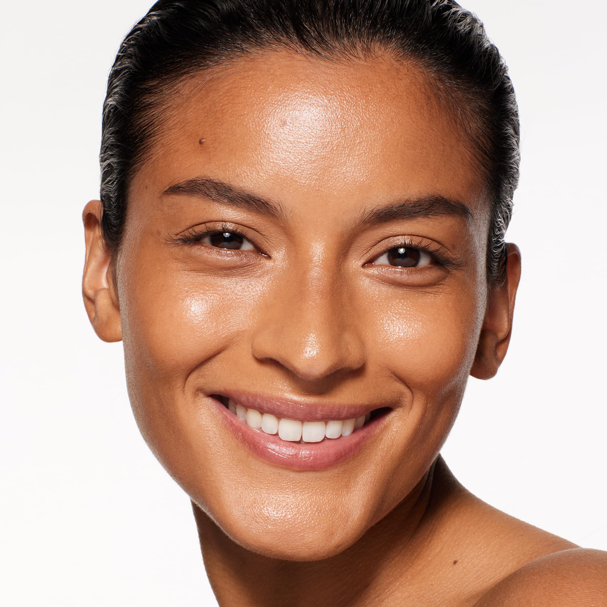 Shiseido RevitalEssence Bronze 420 shade bottle with bronze glow.