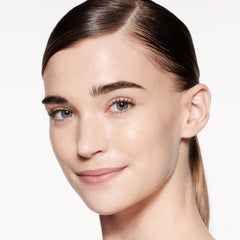 Shiseido RevitalEssence Foundation in natural light showcasing even skin tone