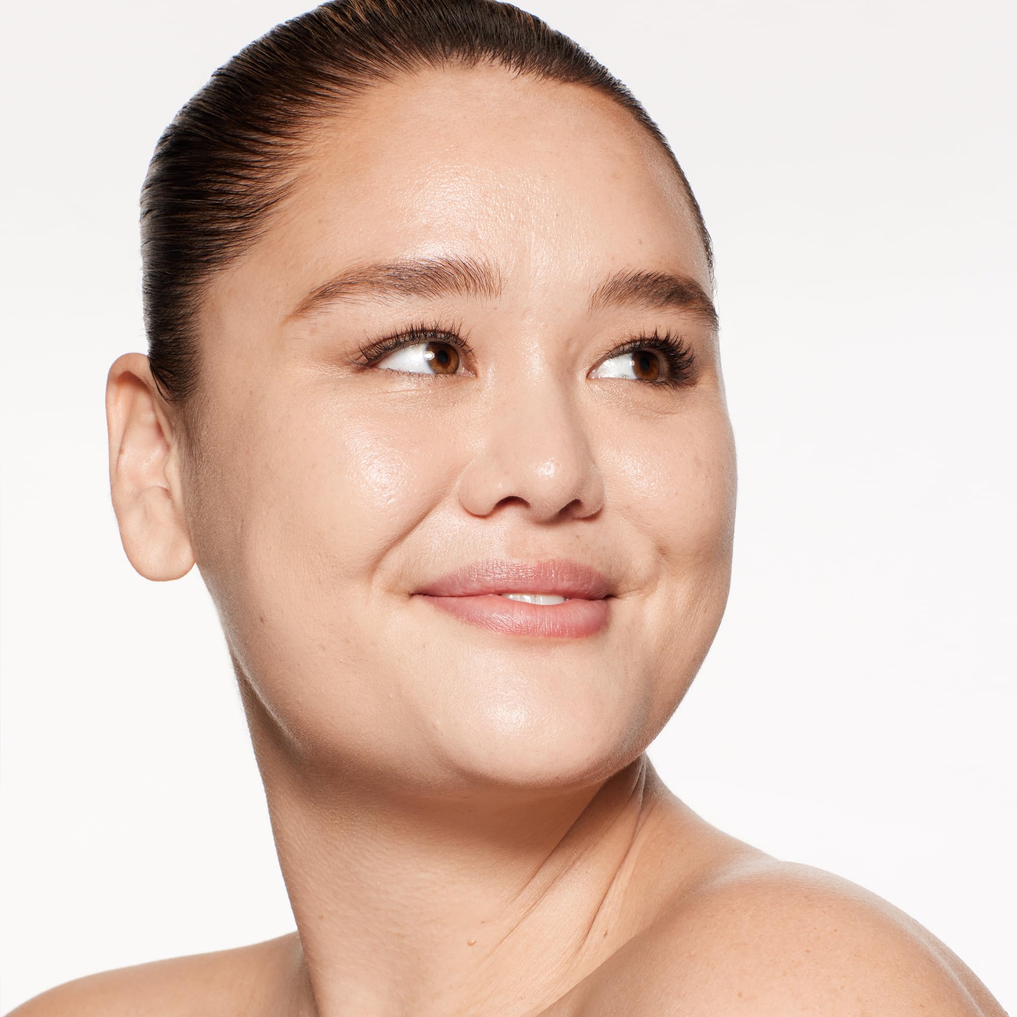 Sand 250 swatch demonstrating even-toned glow with Shiseido foundation.