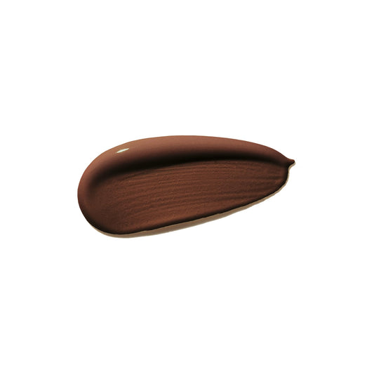 Shiseido Synchro Skin Foundation Obsidian 560 texture swirl demonstrates blendable, natural finish.
