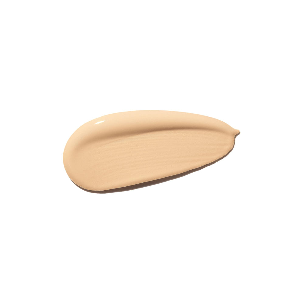 The pump top ensures precise, mess-free dispensing for smooth application.
