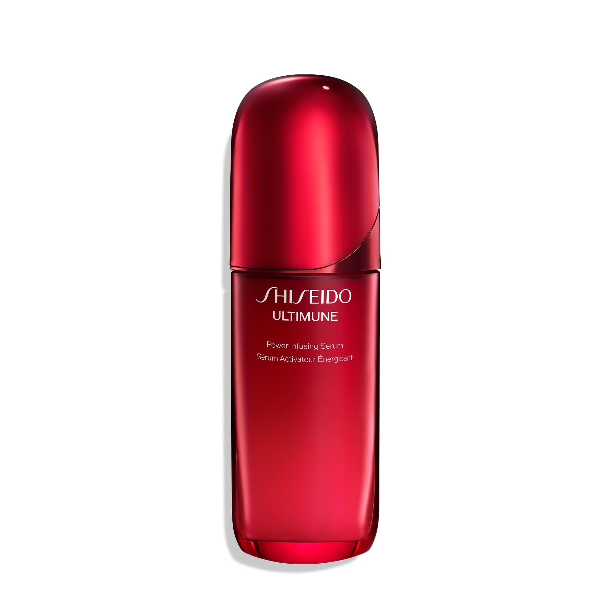 Shiseido Ultimune Serum bottle pouring for day or night skincare