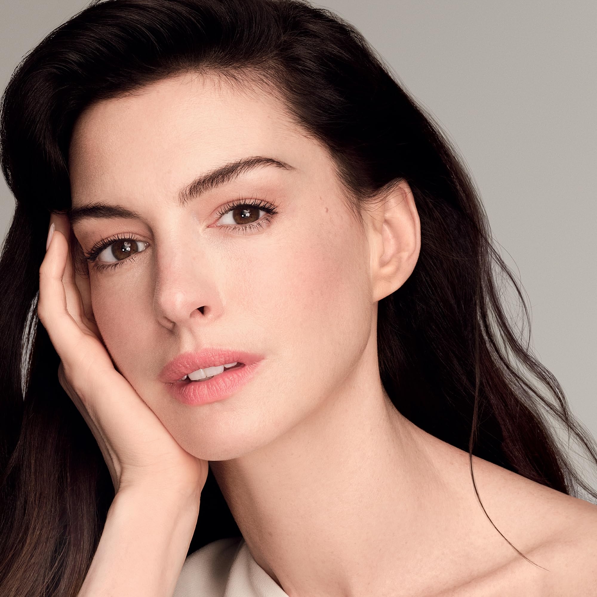 Shiseido Vital Perfection cream on cheek demonstrating lifting potential