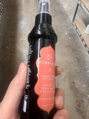 SIeekshop detangler revives unruly strands for easy styling.