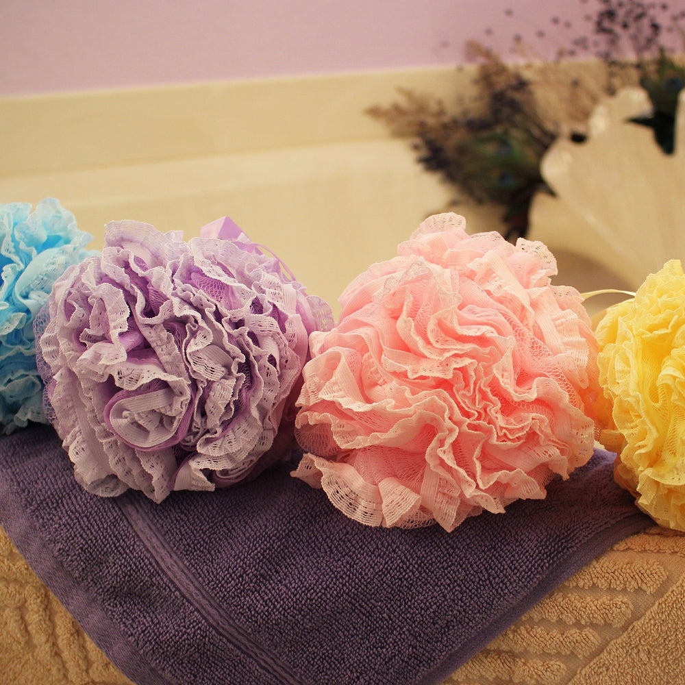Shower Bouquet soft-pink loofah complements daily cleansing routines.