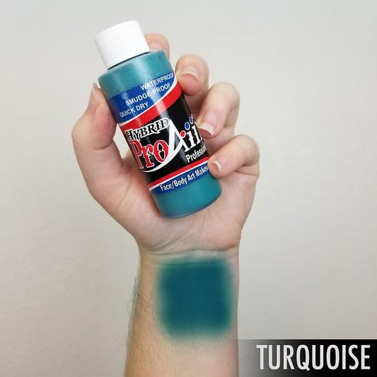 ShowOffs ProAiir turquoise airbrush application for vibrant coverage on skin.