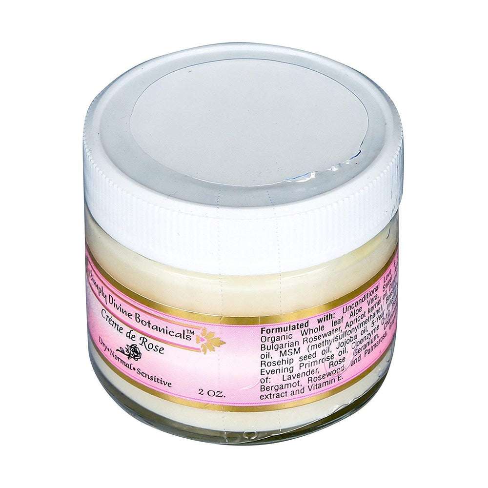 Applying Simply Divine Botanicals Creme de Rose on the skin