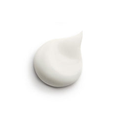 Close-up of Ecological Compound texture showing light, non-greasy finish on skin.