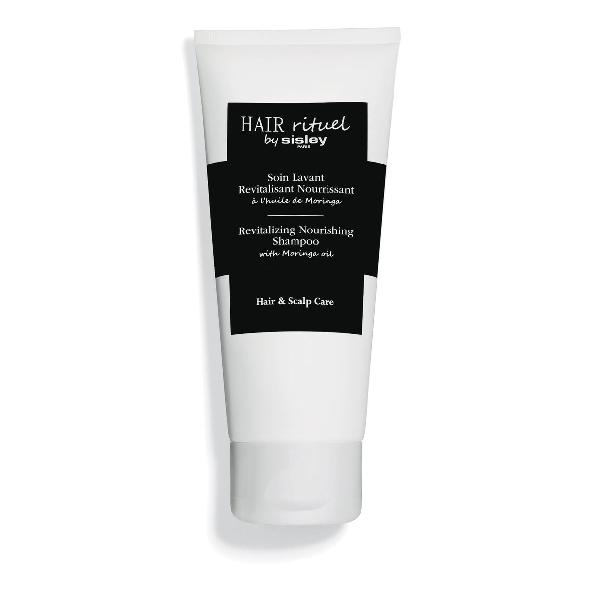 Sisley Paris Revitalizing Nourishing Shampoo bottle close-up for nourishing care