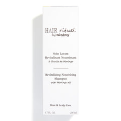 Sisley Paris Revitalizing Nourishing Shampoo texture close-up indicating silky results