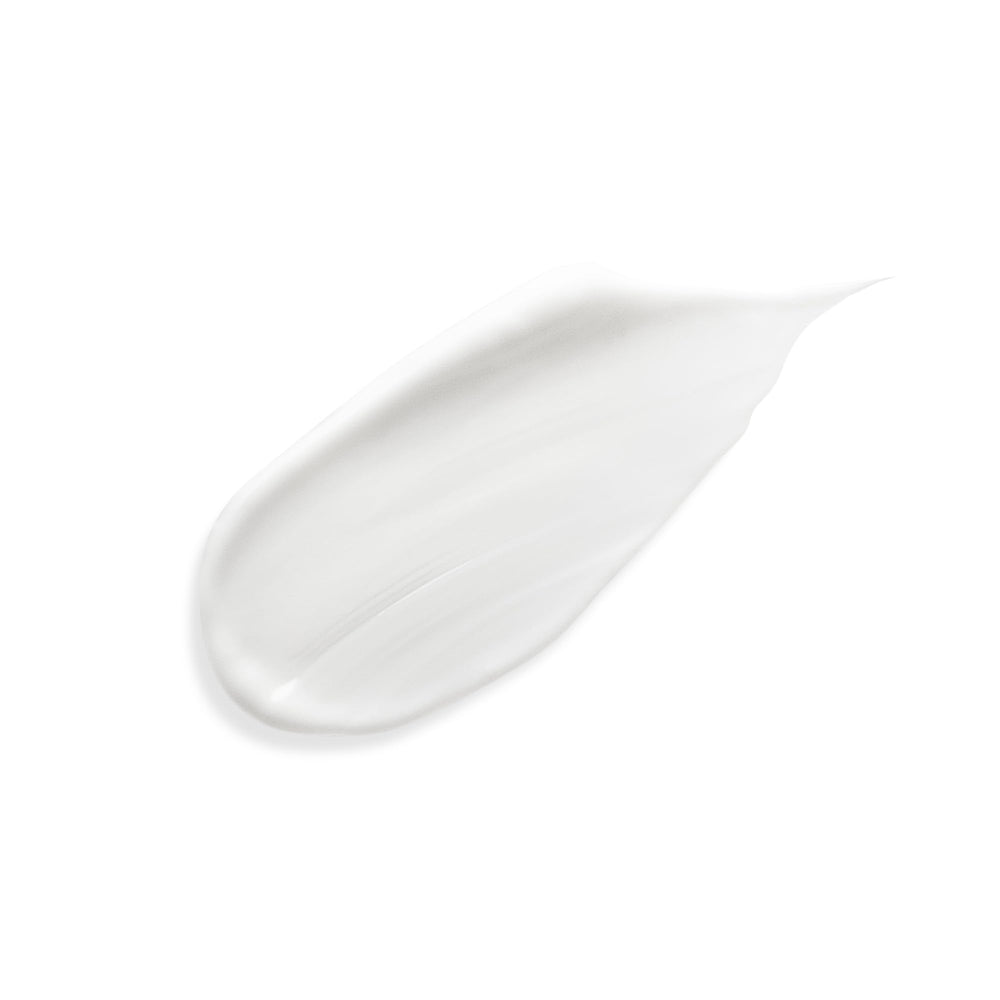 Sisley Paris Soothing Care texture spreading on skin for immediate comfort.