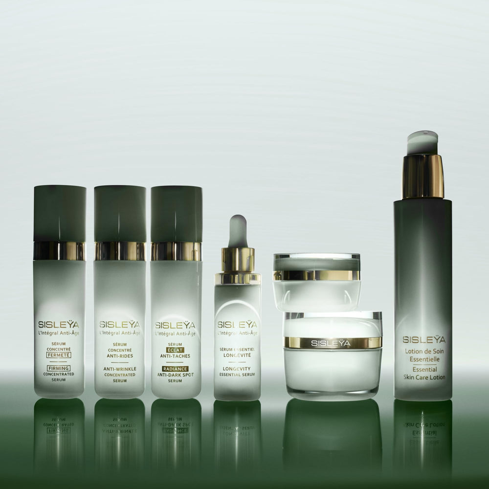 Sisley Paris Sisleya L'Integral Serum close-up of product ritual and luxury feel.